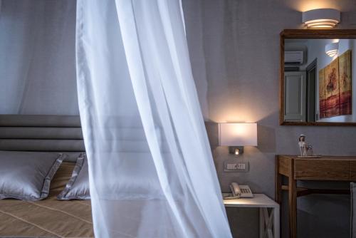 Katil atau katil-katil dalam bilik di Omiros Boutique Hotel (Adults Only)