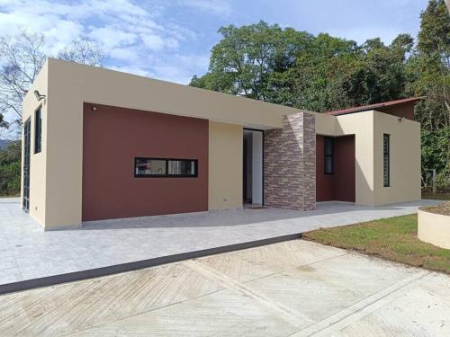 a rendering of a house with a driveway at Avemaría! in Puente Nacional