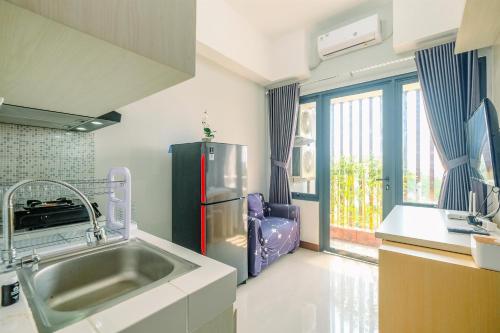 Φωτογραφία από το άλμπουμ του Comfortable and Simply Look 2BR Royal Heights Apartment By Travelio σε Bantarkamang