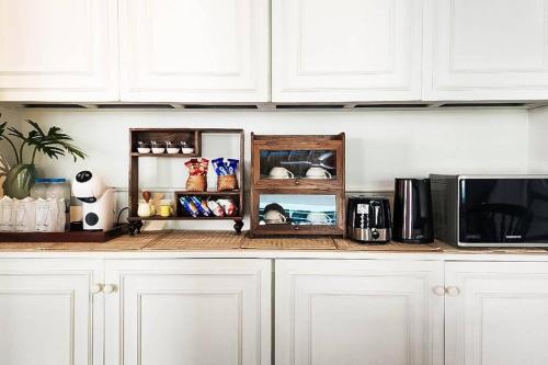 Kuchyň nebo kuchyňský kout v ubytování Siraburi boutique pool villa at Center of old town