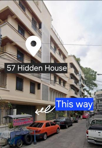 a sign for a kitchen house in front of a building at 57 Hidden House BKK Chinatown in Bangkok