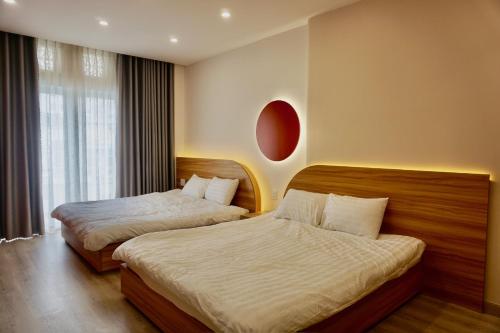 Cama o camas de una habitación en CC Xanh Xanh