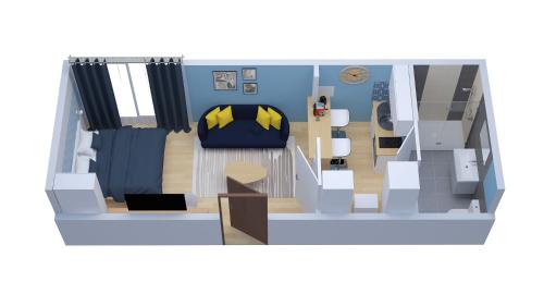 - un modèle de salon avec un canapé dans l'établissement A L'ABORDAGE APPART - Lorient centre - Au calme, à Lorient