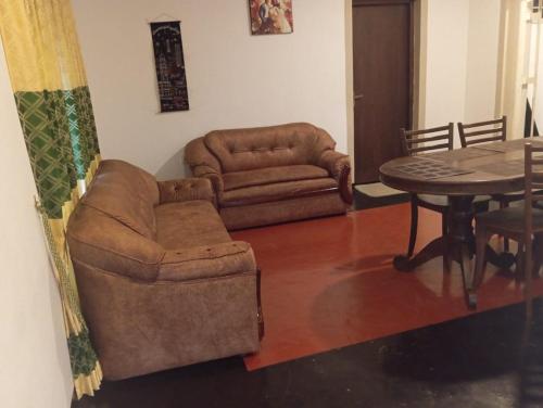 Zona de estar de Ella Relax Inn