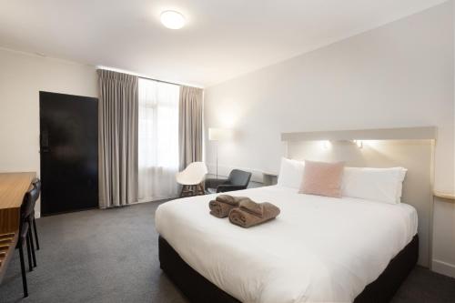 Ein Bett oder Betten in einem Zimmer der Unterkunft Maffra Motor Inn
