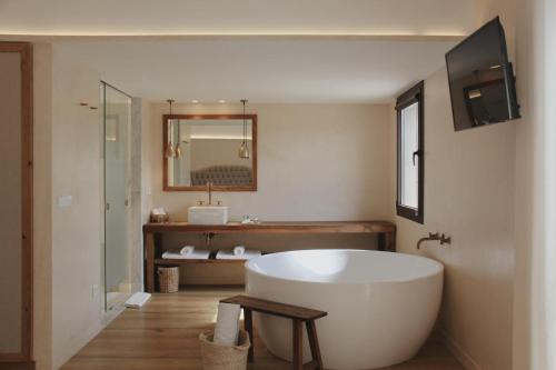 Ένα μπάνιο στο Hotel Palau Macelli & Spa