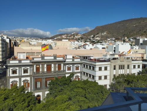 a view of a city with a building at Sky Santa Cruz Penthouse in Santa Cruz de Tenerife