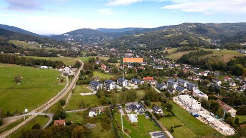 an aerial view of a small town in the mountains at Spokojna, Sun & Snow in Wisła