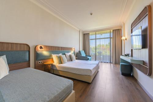 Postel nebo postele na pokoji v ubytování Kristal Hotel - All inclusive - Fully renovated rooms 2025