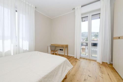 Postel nebo postele na pokoji v ubytování Garda Relax Apartment