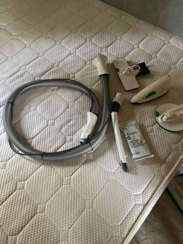 a tennis racket and other items on a bed at Roubenka Doubravice in Hrubá Skála