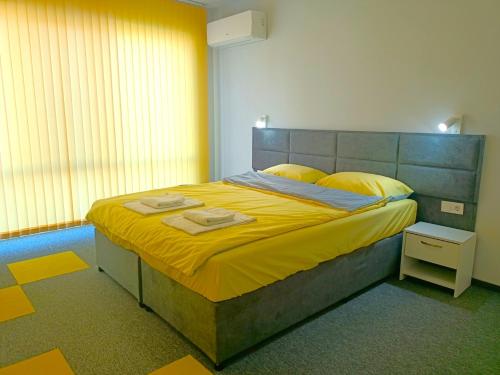 Postel nebo postele na pokoji v ubytování Ubis Hotel
