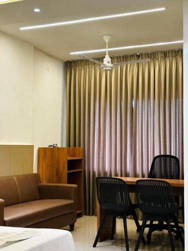 Χώρος καθιστικού στο Hotel Citywalk Residency