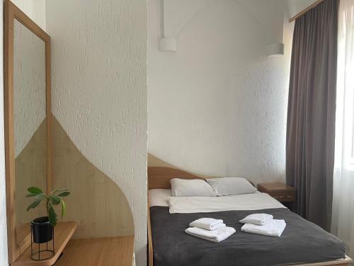 Postel nebo postele na pokoji v ubytování Hotel Femina