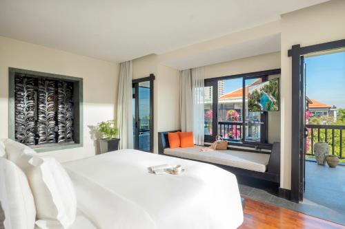 Postel nebo postele na pokoji v ubytování Anantara Mui Ne Resort