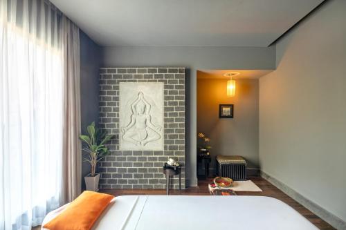 Postel nebo postele na pokoji v ubytování Anantara Mui Ne Resort