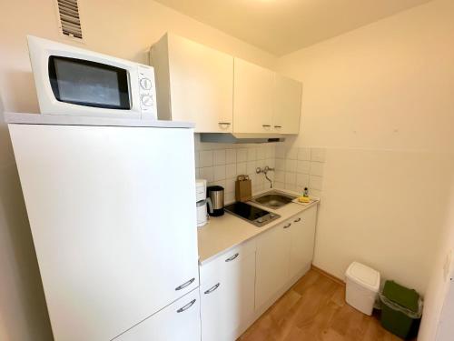 Cucina o angolo cottura di Appartement Helmut mit Sauna und Pool