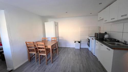 Kuchyň nebo kuchyňský kout v ubytování Apartmánový dom Most pri Bratislave