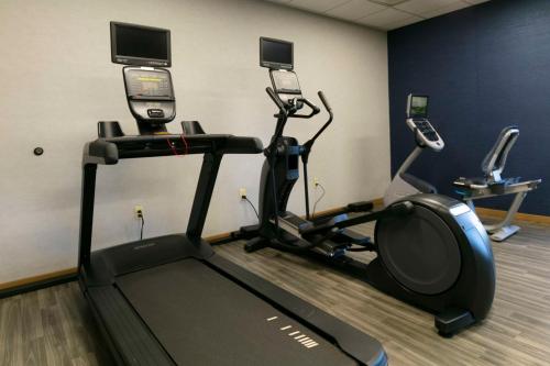 a gym with two treadmills and three cell phones at Hampton Inn Scranton at Montage Mountain in Scranton