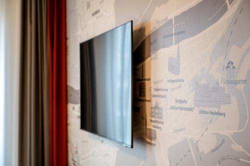 TV a/nebo společenská místnost v ubytování IntercityHotel Heidelberg