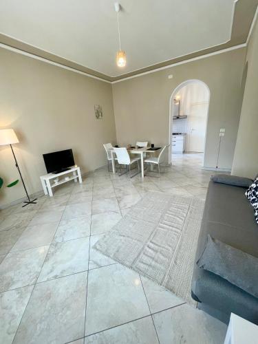 a living room with a couch and a table at Il Cantuccino in Montecatini Terme