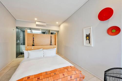 Ένα ή περισσότερα κρεβάτια σε δωμάτιο στο Alpine Attitude Boutique Hotel & Conference Venue