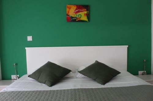 Katil atau katil-katil dalam bilik di Rainbow Apartments