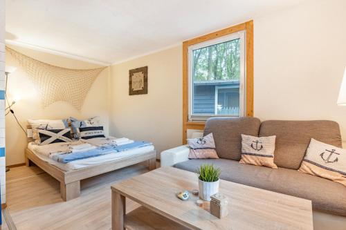 Ένα ή περισσότερα κρεβάτια σε δωμάτιο στο Bungalow zum Leuchturm, Bgl 20