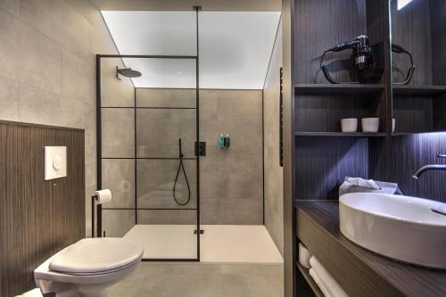 Koupelna v ubytování Hotel Hallensis