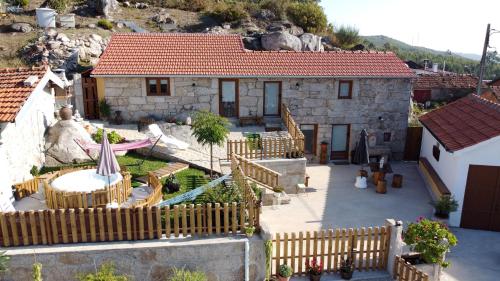 an aerial view of a house with a yard at Casa do Alto in Oliveira de Frades