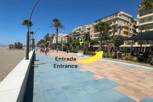 an image of an emirada entrance on a beach at Primera linea de playa Apartamento ELENI in Estepona