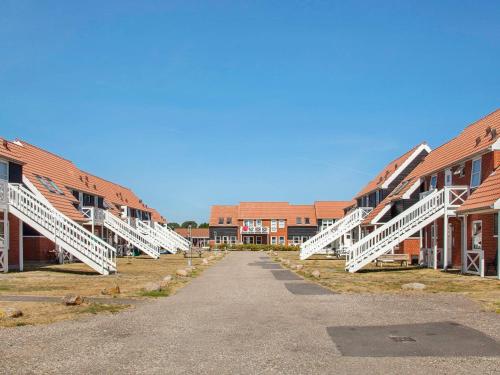a row of white stairs on a campus at Apartment Borre XII in Borre
