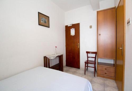 Ένα ή περισσότερα κρεβάτια σε δωμάτιο στο Apartments Juri