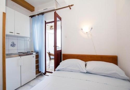 Ένα ή περισσότερα κρεβάτια σε δωμάτιο στο Apartments Juri