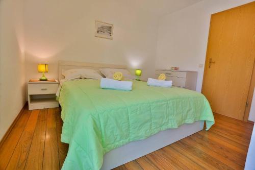 Postel nebo postele na pokoji v ubytování Apartment Lenka Mato
