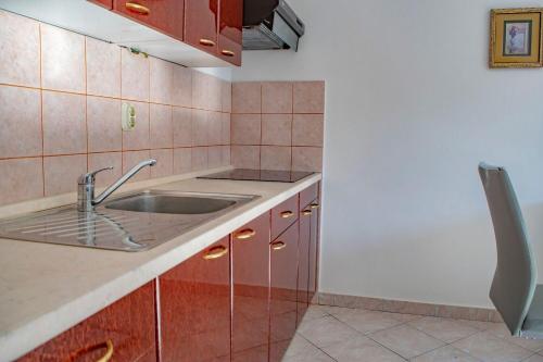 Kuchyň nebo kuchyňský kout v ubytování Apartments Daira