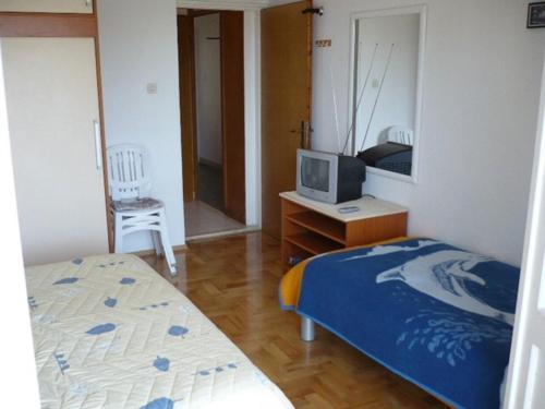 Posteľ alebo postele v izbe v ubytovaní Apartment Eta
