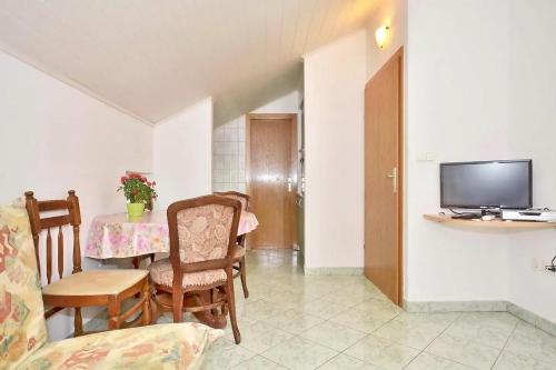 Televisyen dan/atau pusat hiburan di Apartment Toma