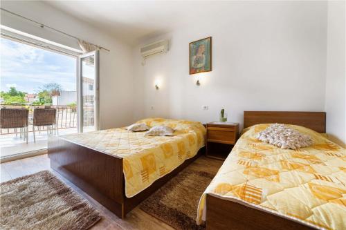 Posteľ alebo postele v izbe v ubytovaní Apartment Goge