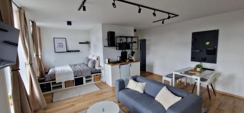 Posezení v ubytování Charleroi Cozy Home