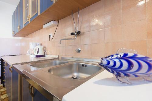 Kuchyň nebo kuchyňský kout v ubytování Apartments Vinko