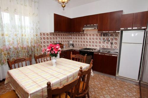 Kuchyň nebo kuchyňský kout v ubytování Apartments Mar