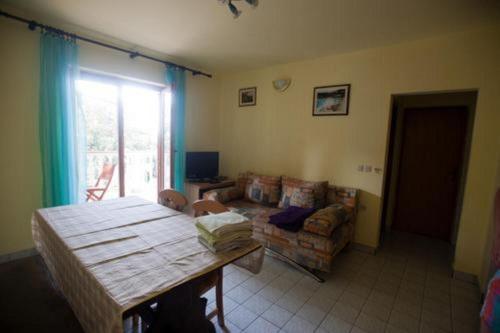 Televisyen dan/atau pusat hiburan di Apartments Luka