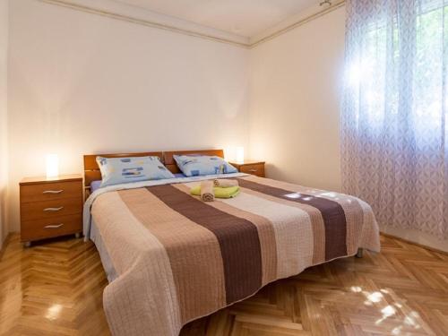 Posteľ alebo postele v izbe v ubytovaní Apartments Petar
