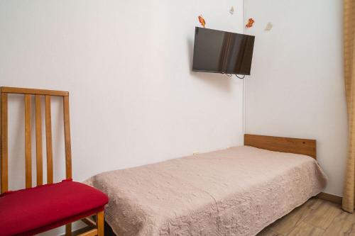 Ένα ή περισσότερα κρεβάτια σε δωμάτιο στο Apartments Pavo