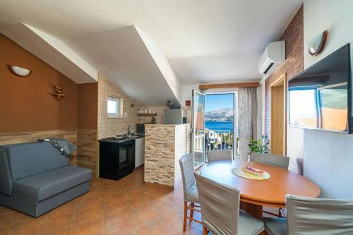 Η κουζίνα ή μικρή κουζίνα στο Apartments Pavo
