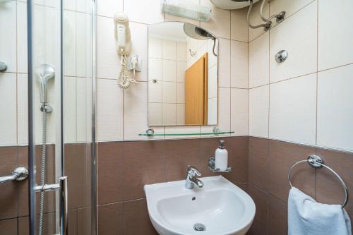 Ένα μπάνιο στο Apartments Pavo