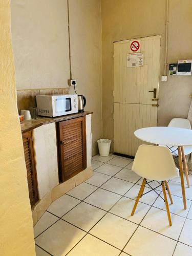 Kuchyň nebo kuchyňský kout v ubytování Tranquilo Guesthouse