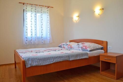 Postel nebo postele na pokoji v ubytování House Mary