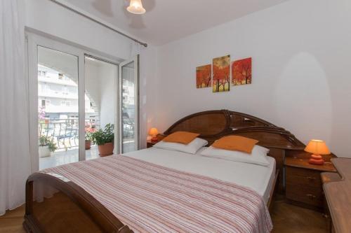 Postel nebo postele na pokoji v ubytování Apartments Ruza